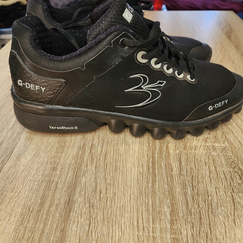 Gravity Defyer G-DEFY athletic shoes featuring VersoShock III technology.